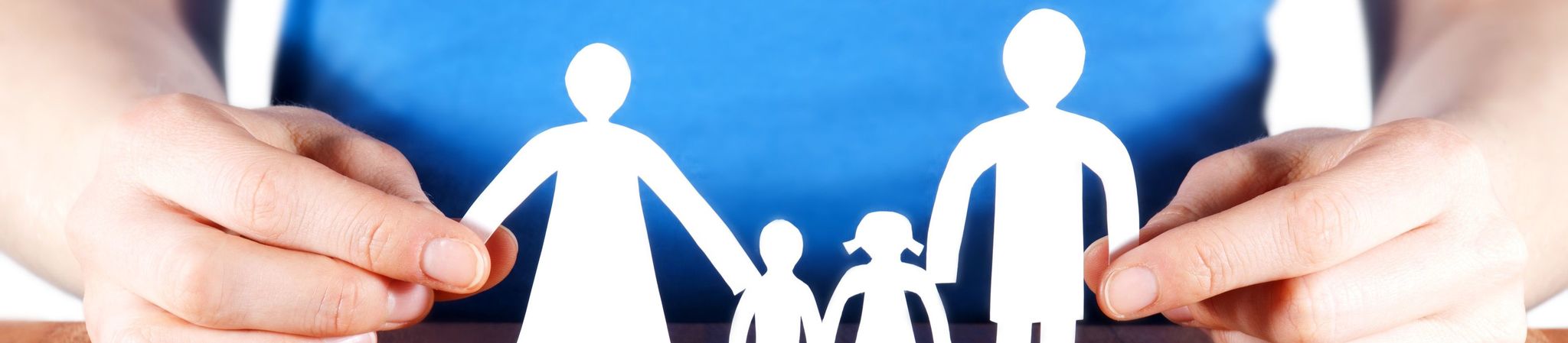 Paper cutout of a family