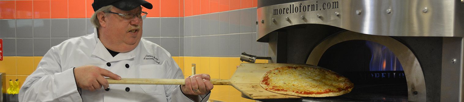 Pizza in oven at Bistro