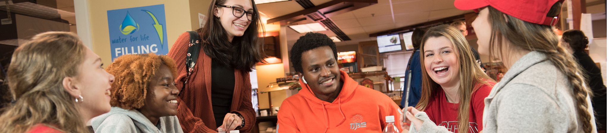 Students eating at Hilltop food court